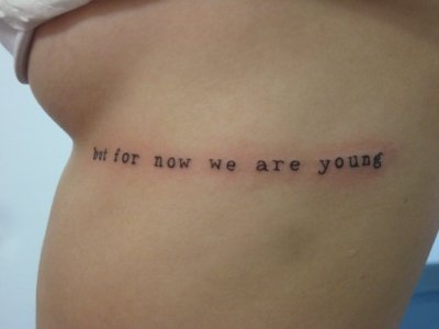 My tattoo right after I got it.. “but for now we are young”