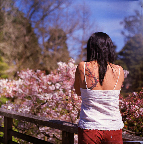 Cherry Blossom Girl (via chcharlie)Great tattoo.