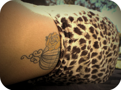 birdcage tattoo. my irdcage tattoo shows.