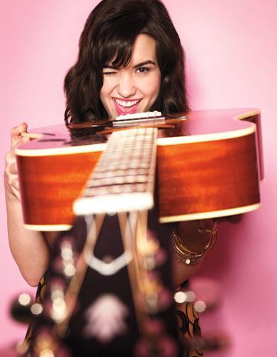 Demi Lovato rocks the guitar
