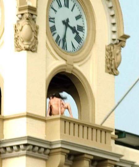 Shocking pictures have emerged of a stark naked couple having sex on clock 