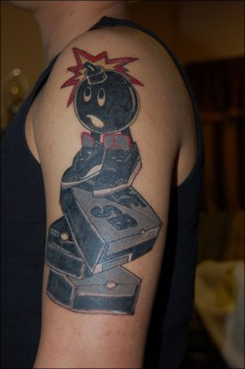 some guy&#8217;s tattoo. hundreds x black cement 3s x nike sb