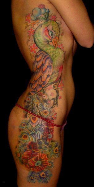 Flower tattoo design on side body Lily tattoos design