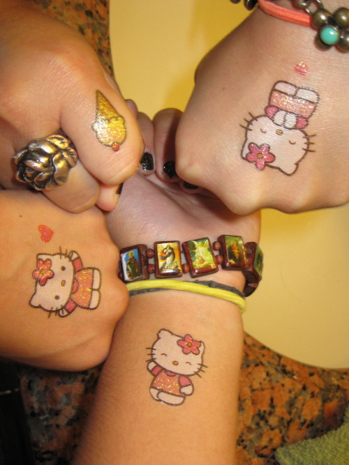 hello-kitty: Glittery Temporary Tattoos Submitted by shaiinar These are so 