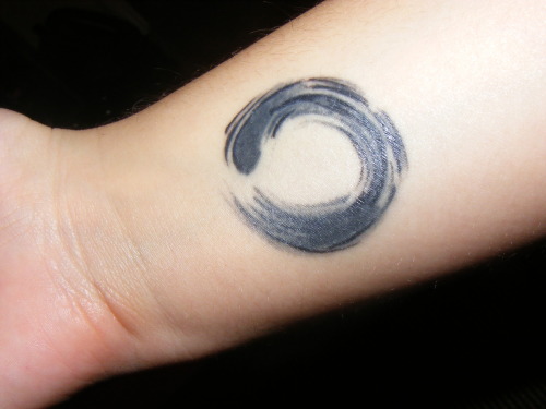 This tattoo is on my right wrist. I always liked what the zen circle (