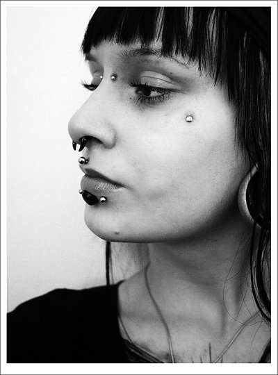 Posted June 5, 2010 at 12:00am in piercings lip septum stretched ears 