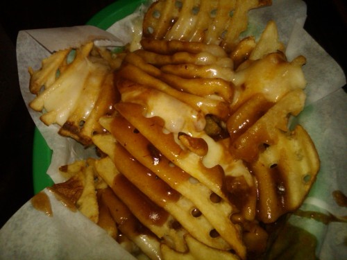loaded waffle fries. cheese waffle fries inside