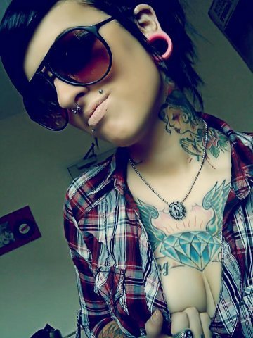 female with tattoos