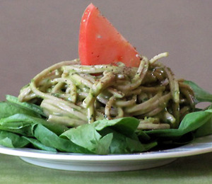 Ok, so this recipe looks TO-DIE-FOR. I love the idea of a pesto sauce made with avocados to give it a creaminess along with the fresh herbs. I personally am a huge fan of using soba noodles as well so I am super excited to try this out. It looks so fresh, gorgeous, and satisfying. I have an heirloom tomato at home that has its name all over it for this dish. 
There will be evidence afterwards and follow-up with how it went. Beware!
findvegan:

Creamy Basil and Mint Pesto Pasta on SpinachServes 6What You Need:
2 packages soba noodles, or 1 box of regular pasta,any shape
Zest of 1 lemon
Juice of 2 lemons
2 ripe avocados
1 clove of garlic
few big handfuls fresh basil
1 big handful fresh mint
1/4 cup olive oil
1/3-1/2 cup vegetable broth
salt and pepper to taste
spinachTo make:In a large pot of salted water, cook the noodles you are using according to package directions. Drain and set aside.
Prepare the Creamy Basil and Mint Pesto:Add the lemon zest, juice, garlic, avocados, basil, and mint in a food processor. Pulse and mix well. Drizzle in the olive oil and a pinch of salt and pepper. Pulse to mix again. The pesto will still taste strong and lemony. Now slowly start adding in vegetable broth (about 1/2 cup) until the flavor and texture is good and to your liking. Add any additional salt and peeper if needed. Add the pesto to the noodles, and toss to mix well.
To Serve:Place a large handful of spinach in the bottom of a bowl or plate. Top with the paste, and garnish with sliced tomatoes. Add a little pepper to the top, and enjoy!!
