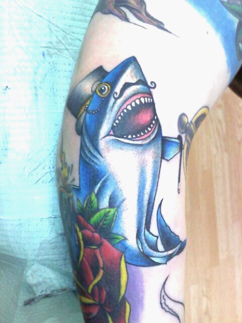 a quite fanciful shark done by Kyle Berg Dark Water Tattoos Bridgeview