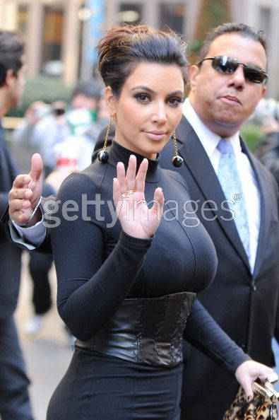 Kim Kardashian lookin a lil cold with the rock hard nipple lol