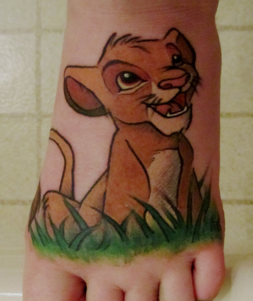 This is my seventh and most painful tattoo located on my foot. Lion King was