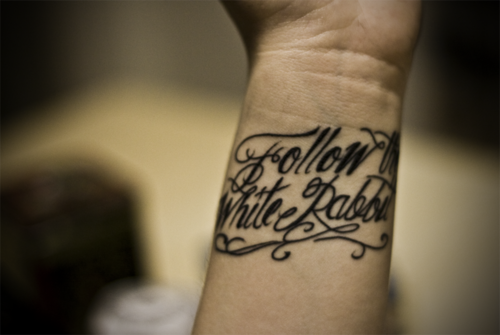 Tags: tattoo ink white rabbit alice in wonderland script arm wrist