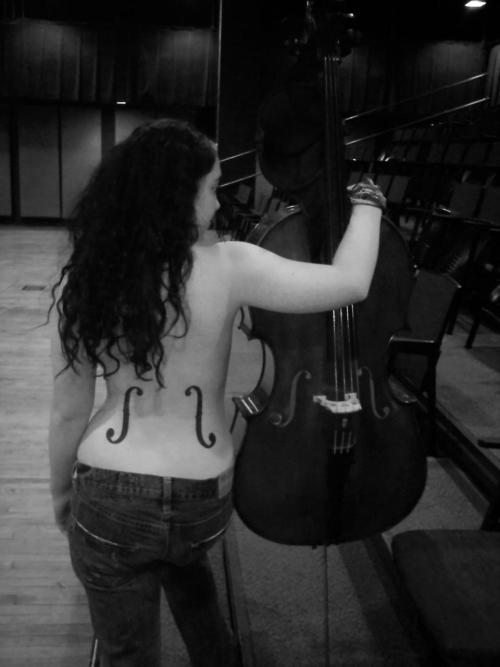  holes beside those of his cello. (: I'd totally get these tattoo'd on me