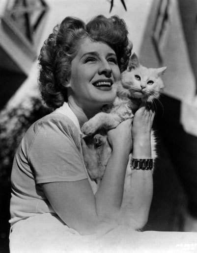 Norma Shearer and a furry friend norma shearer and a cat