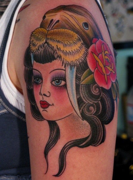 Her portfolio mainly consists of traditional and neotraditional tattoos and