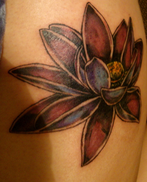 my lotus flower tattoo on my thigh this is my second tattoo