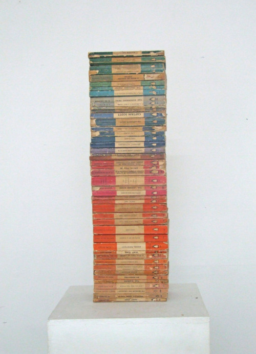 SUBMISSION: My collection of penguin books stacked on a plinth at uni. Photographed as part of an on-going project.