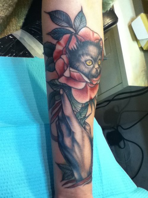 Cat in rose tattoo by