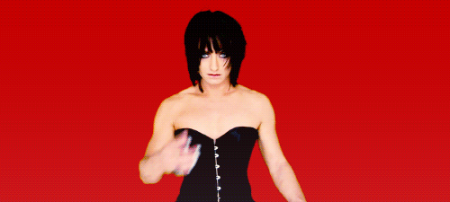 batwithbutterflywings:  dinokitten:allioette:tranzient:theskyandtheimpossibleexplode:porlthompson-:two-dancers:froghat:annashake: [image: Animated gif of a male-bodied person in front of a red background. They have bright blue eyes, shoulder-length straight dark hair, and they are wearing pinkish-red lipstick, eyeliner, and a black/dark blue bustier. They are posing for hte camera, giving “bedroom eyes” and generally acting all sultry. It takes a while to realize that the person is Jude Law.] HOLY SHIT. That’s Jude Law?! Fuck me running .. it IS Jude Law. I’ve always found him incredibly hot, but .. Fuuuuuck me. Androgyny has never been sexier.  