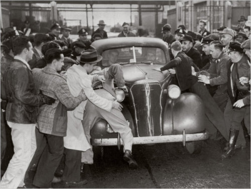 carryonbaggage Protesters storm a car full of workers leaving the strike 