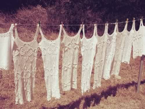 Handmade Crochet Dresses Hanging to Dry