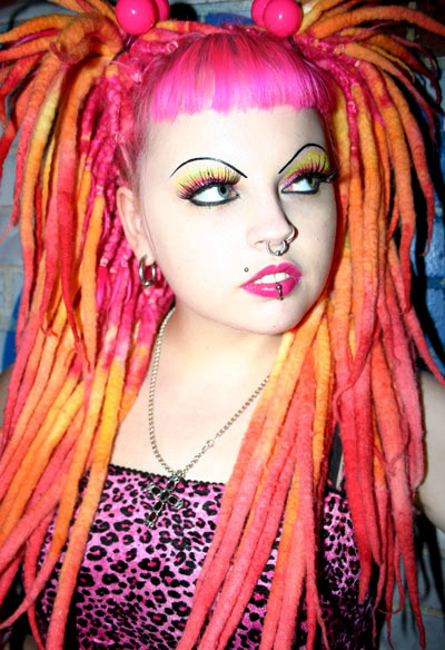 Short Hair Dreads. pink orange hair dreads girl