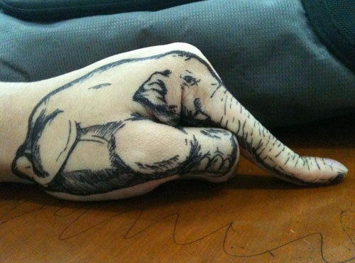 elephant tattoo hand tattoo