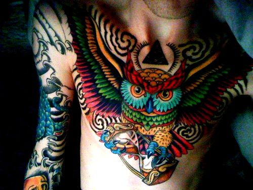 both chest tattoos and owl tattoos are usually pretty lame but i love the 
