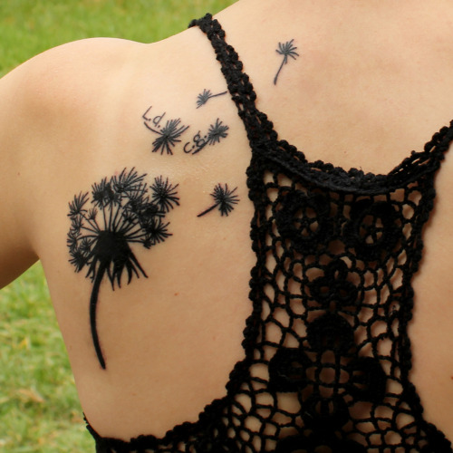 I got this dandelion tattoo April 29 2011 There are two sets of initials 