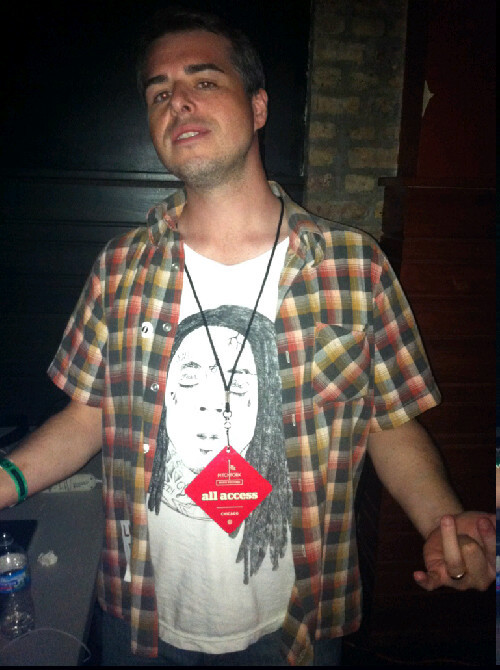  wearing Pitchfork Music Festival all access badge and Lil Wayne Tee