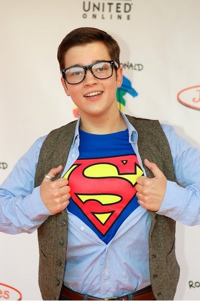 Nathan Kress dressed as Clark Kent becoming Superman Posted 8 months ago