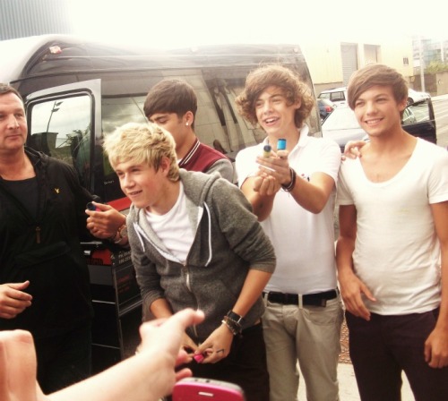 foreveryoungciara:  This is a picture I took of the boys outside fm104 in DublinThey were popping party poppers at us!  I still cant get over seeing them in the flesh :’)Honestly one of the best days of my life.  