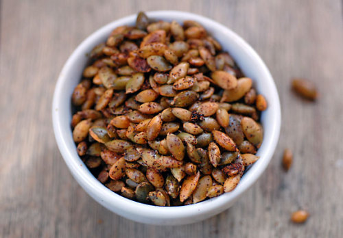 PEPITA’S PLEASE! Since having lightly spiced/salted pumpkin seeds at Golden Fields, I have become mildly obsessed. I have always loved these little seeds as they are an amazing source of magnesium, iron and zinc but found them a little un-inspiring. However, I found this little recipe on elanaspantry.com and BAM they are a phenomenal tasty snack full of goodness and seriously addictive.
Chilli roasted pumpkin seeds: 1 cup of pumpkin seeds, 2 teaspoons olive oil, 2 teaspoons of chilli powder, 1 teaspoon of sea salt. Place pumpkin seeds in a large pan over medium heat stirring frequently for 3-5 minutes until seeds make a crackling noise, remove from heat and stir in olive oil, chilli powder and salt, cool and serve. 