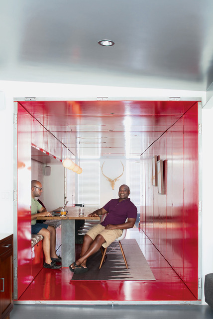Assembling the shipping container inside the apartment, painting the interior fire-engine red, getting all too familiar with a handheld drill to modify the box—it&#8217;d all been worth it to discover his happy place.<br />
(Photo: Nicholas Calcott; Dwell)