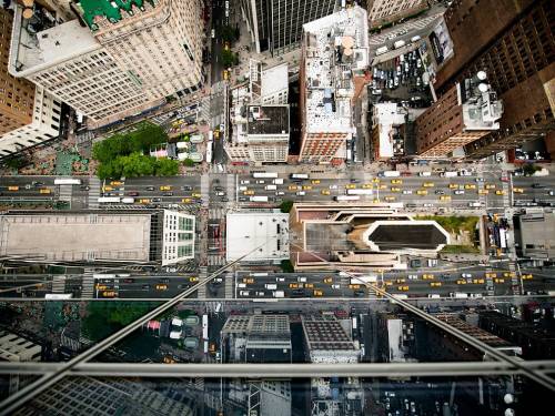 Aerial View, New York CityPhoto: Navid Baraty
Watching the pace and flow of New York City from above is amazing. The constant stream of yellow taxis lining the avenues, the waves of pedestrians hurriedly crossing with the change of traffic signals, little figures disappearing into and emerging from the subway stations, the chorus of honking horns and sirens. It&#8217;s all so rhythmic and strangely soothing to watch. It makes me feel incredibly small.