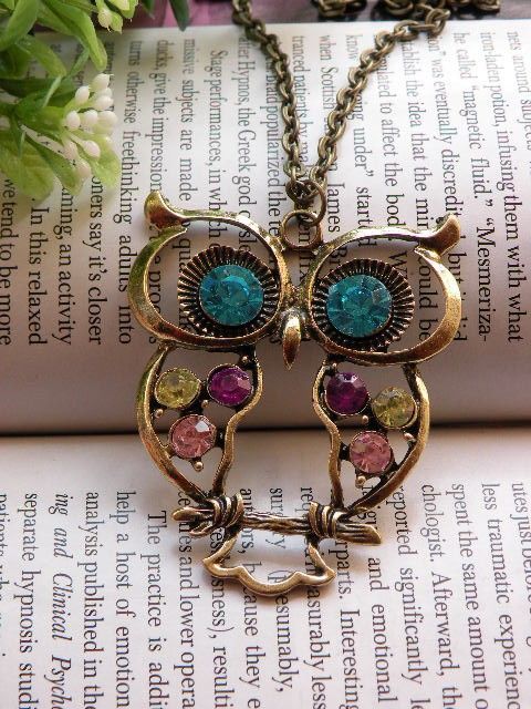 On sales now Pretty retro copper colorful blue by toofashion2010 - wanelo (an owl or two birds?)