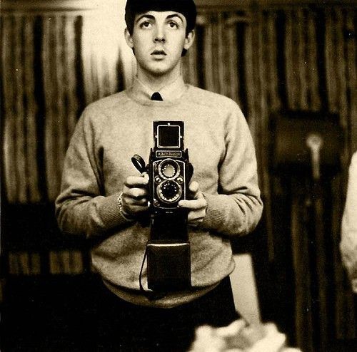 Paul McCartney self portrait with a twin reflex cameraHe&#8217;s quite a keen snapper is old Macca. 