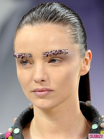Miranda Kerr makes a fashion statement with studded eyebrows