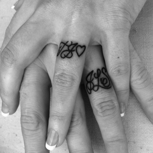  together for 14 years we got our initials on each others ring finger