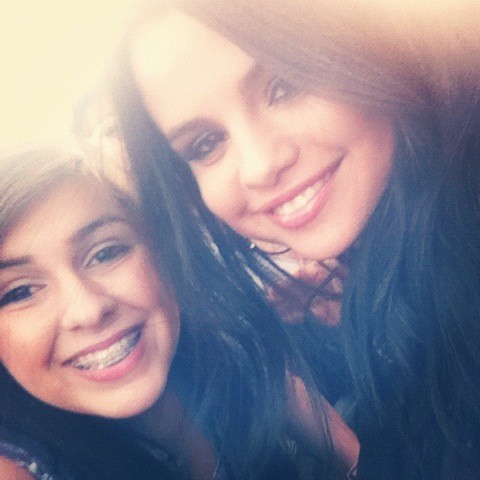  Selena Gomez with a fan (April 18) 