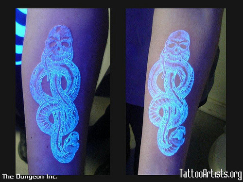 black light tattoos. unless under a lacklight)