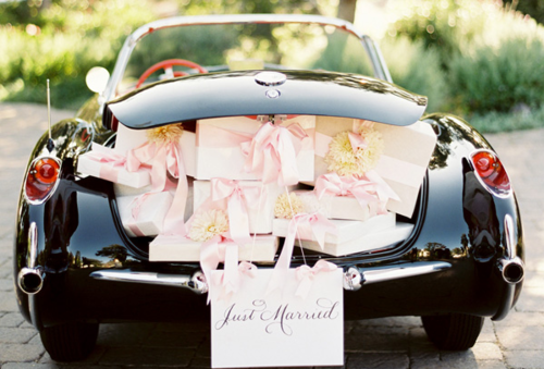 it wrote just married but i wanna shop till my car are full with shopping stuffs just like in the pic!