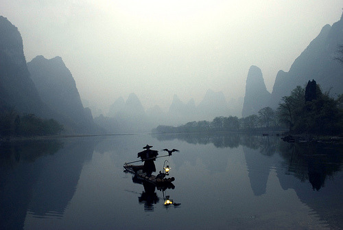 Fisherman with cormorants, Guilin, China | by blind shooting My grandmother was from here. I would love to go one day.
