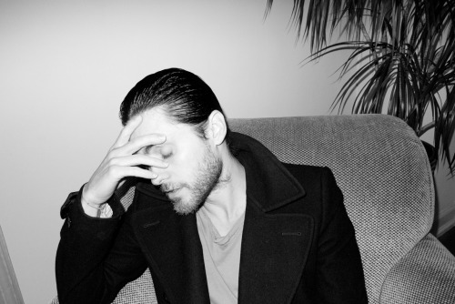Jared Leto in a chair #1